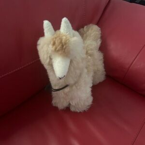 Cream and Tan Plush Stuffed Animal with Fluffy Texture